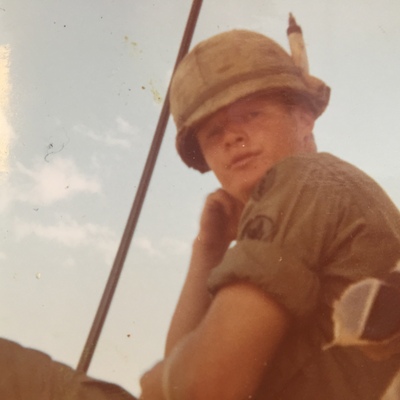 Danny on top his armored personnel carrier