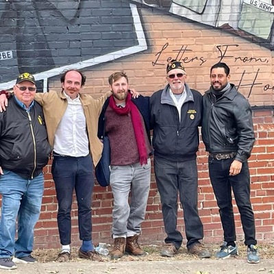 Veterans with Mural Artists