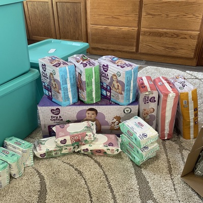 Diapers, wipes, and hygiene kits purchased w/ donations from the community
