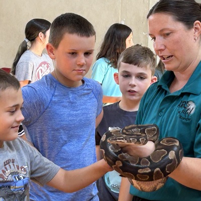Ark Wild brought a python during Summer Reading 2025.