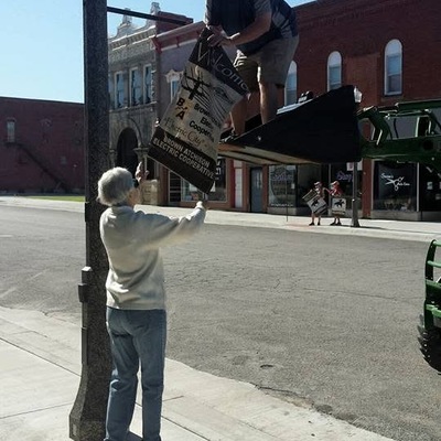 Putting up flags downtown
