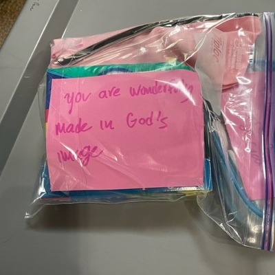 Encouraging message in hygiene bag