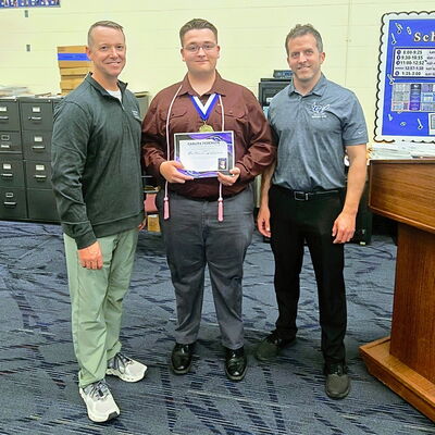 Matthew Bryan (center in photo) is a Senior at Gardner Edgerton HS-Scholarship '26 Winner