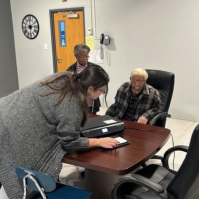 Members of Horton & Everest Lions Clubs providing eye screening.
